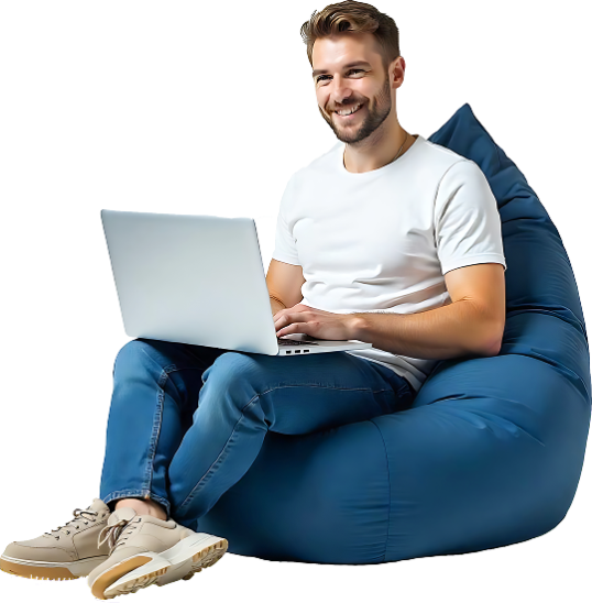 Person working on laptop while sitting on blue bean bag